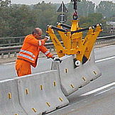 Handling of concrete barriers